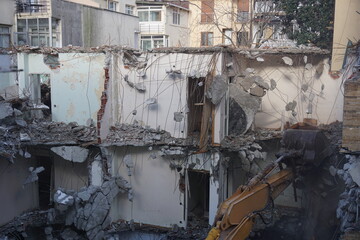 excavator work in demolished building, demolition, debris