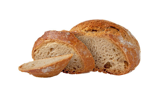 Rye and wheat sourdough bread loaf and slices isolated transparent png. Porous bread pulp and crispy crust.