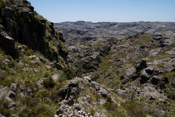Fototapeta na wymiar View of the rock massif Los Gigantes in Cordoba, Argentina, in a sunny day.