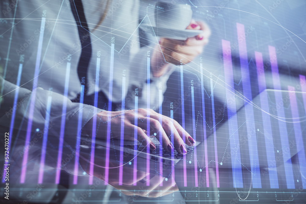 Poster double exposure of businesswoman hands typing on computer and financial graph hologram drawing. stoc