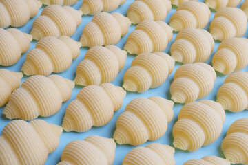 Pasta on a blue background - texture, pattern