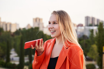 Corporate worker, travel commute and girl recording voice note, walking and talking in the street