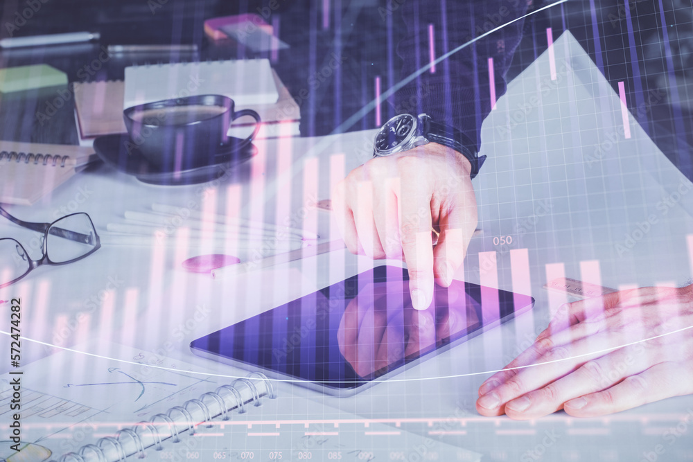 Poster Double exposure of man's hands holding and using a digital device and forex graph drawing. Financial market concept.