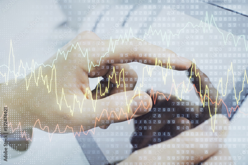 Poster multi exposure of man's hands holding and using a phone and financial chart drawing. market analysis