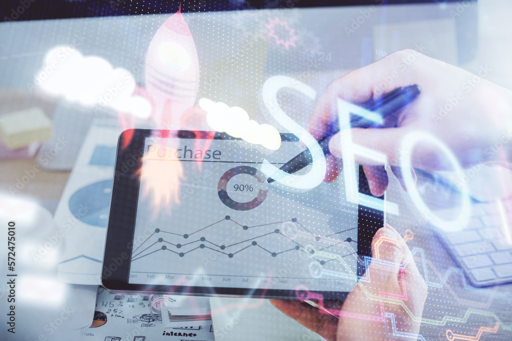 Aufkleber multi exposure of man's hands holding and using a digital device and seo drawing. search optimizatio