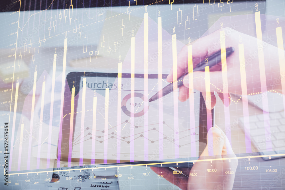 Poster double exposure of man's hands holding and using a phone and financial chart drawing. market analysi