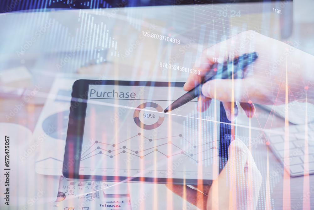 Poster double exposure of man's hands holding and using a phone and financial chart drawing. market analysi