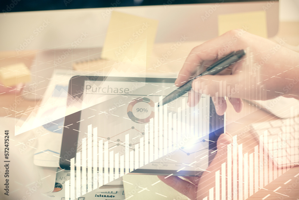 Poster double exposure of man's hands holding and using a phone and financial chart drawing. market analysi