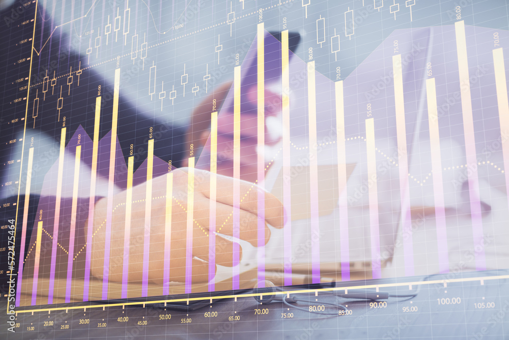 Poster Double exposure of man's hands holding and using a phone and financial graph drawing. Analysis concept.