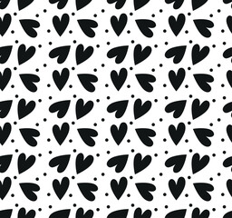 Seamless monochrome pattern with hearts and dots. Vector repeating texture. Perfect for printing on fabric or paper.