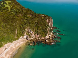 Poster Coromandel Peninsula shining on a summers day along the coast line in New Zealand © Michael