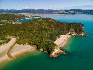 Tuinposter Coromandel Peninsula shining on a summers day along the coast line in New Zealand © Michael