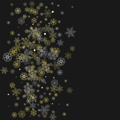 Fototapeta premium Glitter snowflakes frame on black background. Winter window. Shiny Christmas and New Year frame for gift certificate, ads, banners, flyers. Falling snow with golden glitter snowflakes for party invite