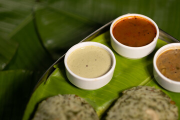 Fresh, savory rice cakes are a popular dish (known as  known as 'rava idli') from southern India and especially the Indian state Karnataka, served alongside sauces.