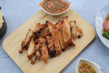 Grilled Pork Neck With Spicy sauce is s Spicy Sour Taste is a Popular Appetizer in Thailand. Thai famous street food
