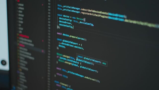 Writing programming functions on PC. Website HTML code on the PC display close up photo. Database bits access stream visualisation.