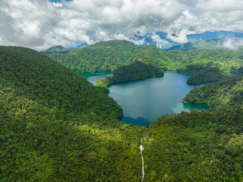 Lake in the mountains among the rainforest and jungle. Balinsasayao Twin Lakes Natural Park. Negros, Philippines