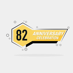 82nd years anniversary logo  vector design with yellow geometric shape with gray background 