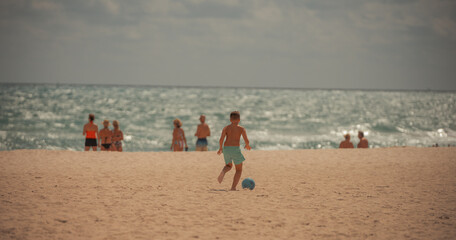 children playing on the beach people vacation miami Florida 