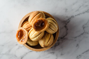 cookies in the form of nuts with caramel