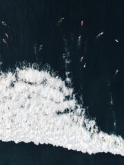 surfers on the water drone view wave