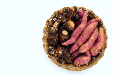 Sweet potato with taro in bamboo basket on white background.
