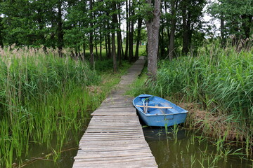 Obraz premium Rowing boat on the shore of Lake Naroch.