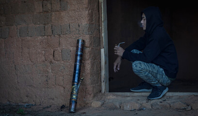 Male smoking with bamboo bong,Concepts of medical marijuana use and legalization of the cannabis.