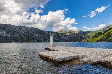 Small lighthouse on artficial island near town of Perast, Montenegro