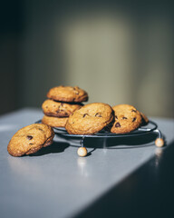 Cookies with chocolate chips on a silver table