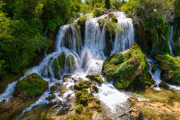 Fototapeta premium Aerial view of amazing cascades of Kravica Waterfall in Bosnia and Herzegovina