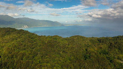 Fototapeta na wymiar Mountains with tropical forest and blue ocean. Tropical landscape. Philippines.