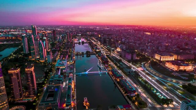 Aerial Hyperlapse above Puerto Madero, Buenos Aires, Argentina Modern Cityscape Sunset of Famous Urban Waterfront and Central Business District