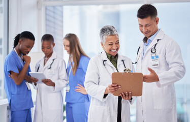 Doctors team, man and woman with checklist, smile and happy for results, progress or feedback in...