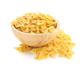 Wooden bowl of raw farfalle pasta isolated on white background