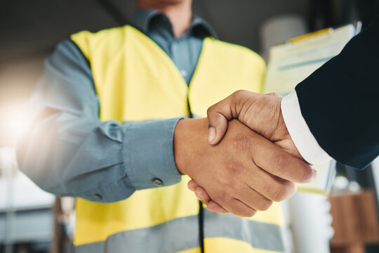 Partnership, handshake and collaboration of engineer in office for contract, deal or onboarding. Architecture, thank you and people shaking hands for hiring, recruitment or agreement, b2b or greeting