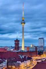Berlin Mitte with the famous TV Tower and the town hall at dusk © elxeneize