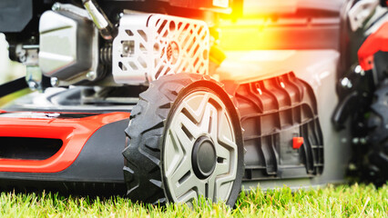 lawn mower on green grass