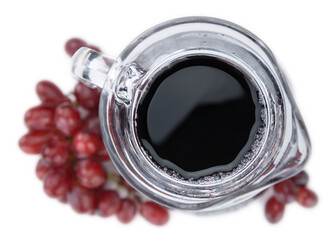 Red Grape Juice on transparent background (selective focus; close-up shot)