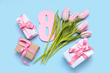 Beautiful tulip flowers, paper figure 8 and gift for Women's Day celebration on color background