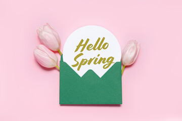 Card with text HELLO SPRING and beautiful tulip flowers on pink background