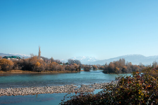 Chirchik river in Gazalkent. Autumn landscape river and mountains. Beautiful views of Uzbekistan. Tashkent region