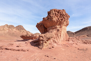 Fototapeta premium Mushroom rock, a rock formed by the erosion of red sandstone in the national park Timna, near the city of Eilat, in southern Israel