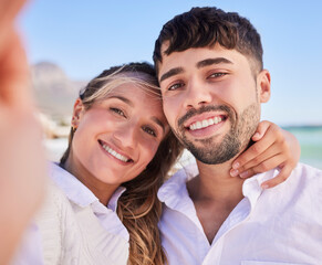 Obraz premium Selfie, couple and happy people on beach date on vacation and holiday trip together with love and happiness. Portrait, man and woman travel bonding with smile on adventure update social media