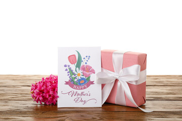 Greeting card with text HAPPY MOTHER'S DAY, hyacinth flower and gift on table against white...