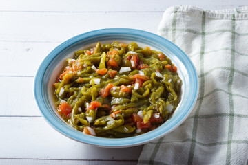 Close-up of roasted bell pepper,tomato and onion salad. Healthy food.