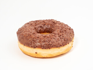 Chocolate donut with chocolate chips on a white background. close-up.