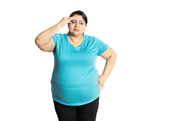 Depressed overweight indian woman standing over white studio background, Plus size female with sad...