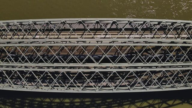 Bird's eye view of train crossing Hohenzollern Bridge, Cologne Germany 