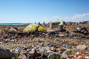 Ruins of a destroyed city. The shattered globe lies on the ground. The concept of the end of the...
